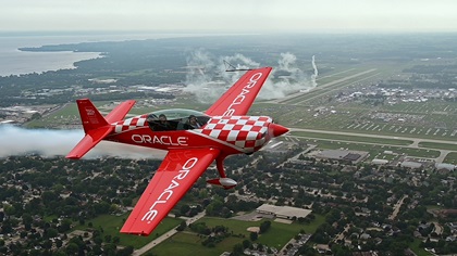 Airshow performer Jessy Panzer flies the Oracle Extra 300L during an EAA AirVenture demonstration flight July 26. Panzer is an Embry-Riddle Aeronautical University graduate and a corporate pilot who teamed up with legendary airshow performer Sean D. Tucker for the 2019 airshow season. Photo by David Tulis.