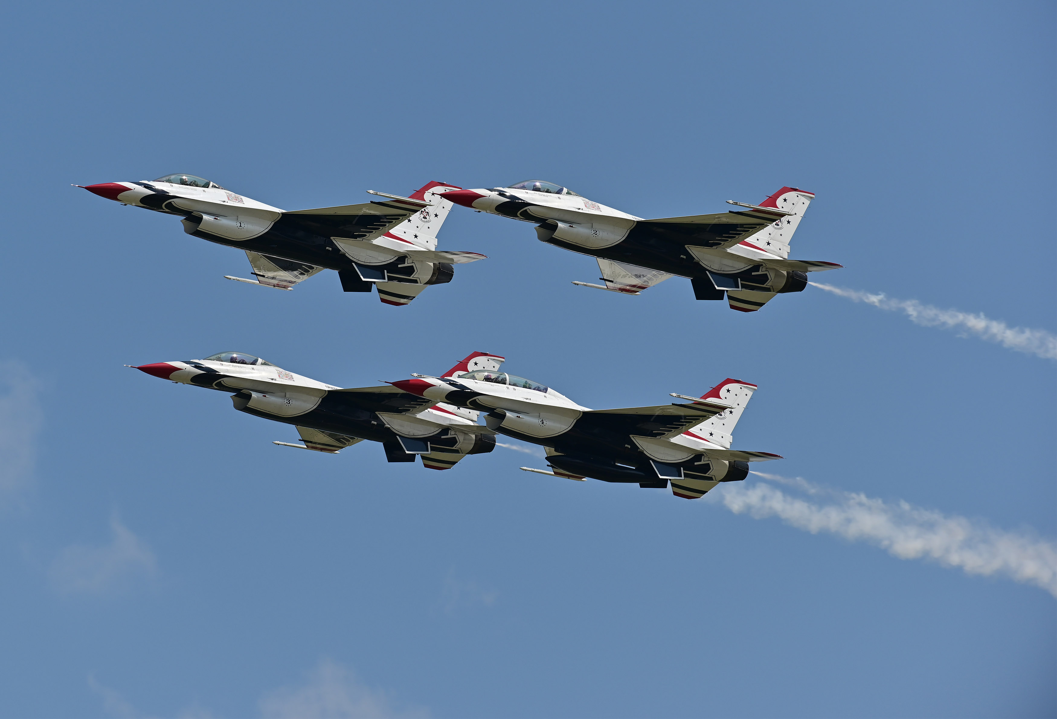 The U.S. Air Force Thunderbirds make a surprise appearance to begin the daily afternoon airshow July 25. The demonstration team is performing nearby at the Milwaukee Air and Water Show. Photo by David Tulis.