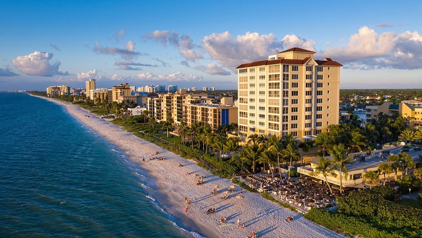 Umbrella canopies nestled together on the Naples coastline are reminiscent of The Turtle Club’s namesake and allow diners unobstructed views of the beachfront. Photo courtesy of the Turtle Club.