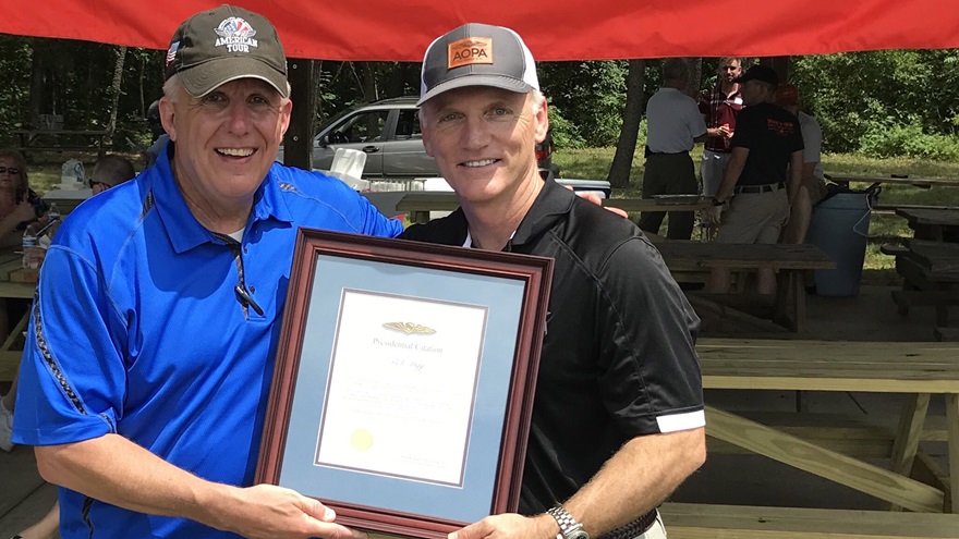 Bob Hepp, the founder of Aviation Adventures, was presented an AOPA Presidential Citation by AOPA Air Safety Institute Executive Director Richard McSpadden on behalf of AOPA President Mark Baker. Photo courtesy of Aviaiton Adventures.