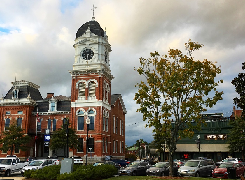 The Covington courthouse (left) on the historic downtown square is used in movies and TV shows, and the Mystic Grill restaurant (right) is based on "The Vampire Diaries." Photo by MeLinda Schnyder.