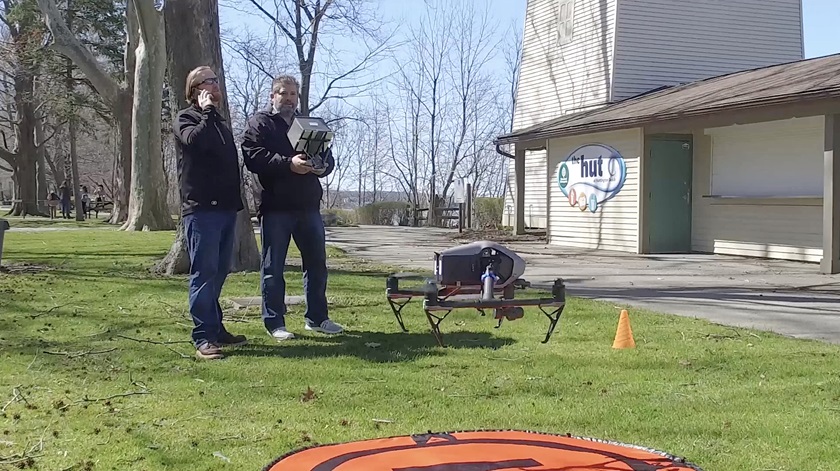 Flight to Remember Chairman and founder Tom Davis, left, and Vice Chairman Kent Iler launch a drone as they document the process of creating virtual experiences for hospice patients. Photo courtesy of The Flight to Remember Foundation.