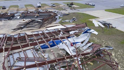 Aircraft secured in hangars did not escape the fury of the storm. Photo courtesy of SkyBama.com/Alabama Aerial Photography.