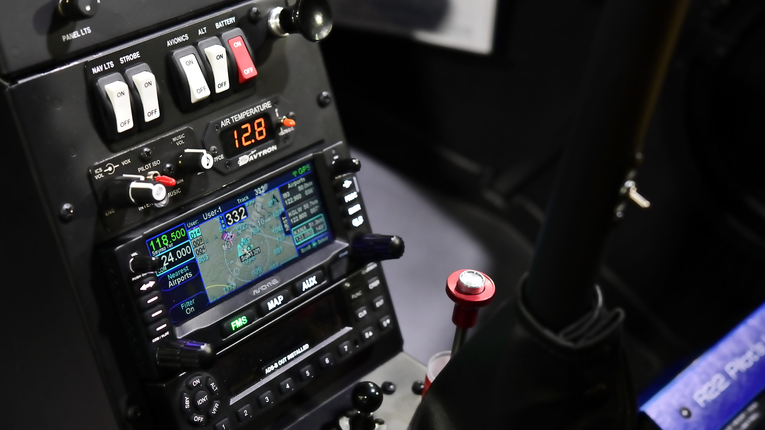 While retro on the outside, the 40th anniversary Robinson R22 helicopter has many updates, including this Avidyne IFD 440 touchscreen GPS/com. The Avidyne is now an option across the Robinson line. Photo by Mike Collins.