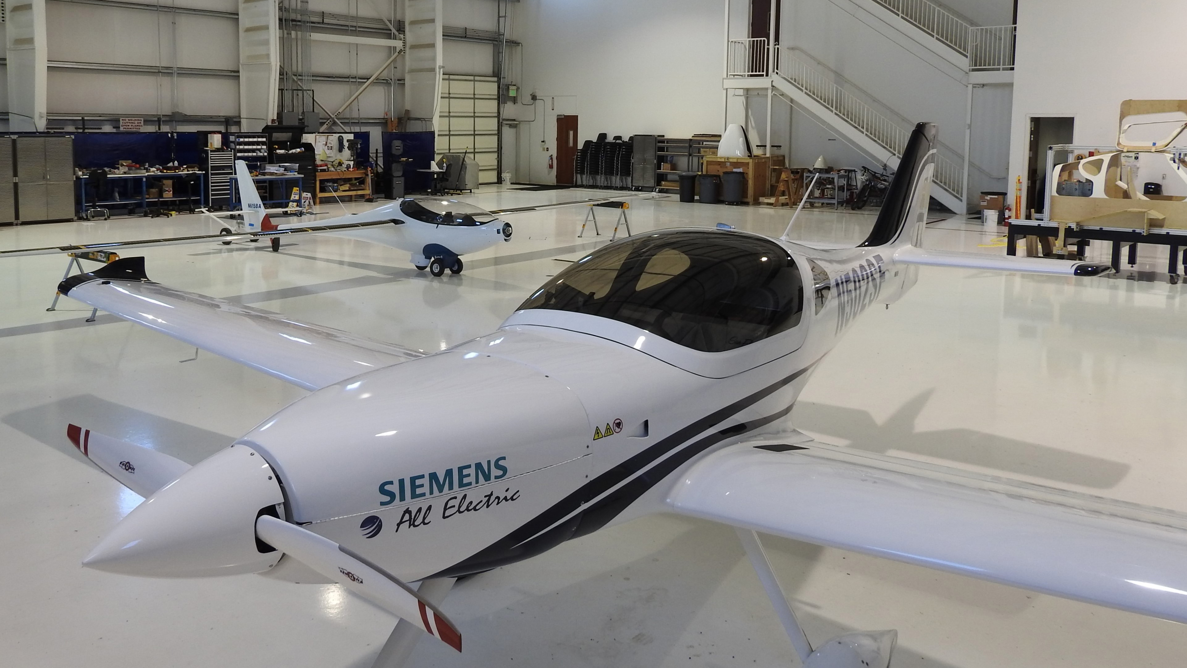 Bye Aerospace has moved into a larger hangar as flight tests of the two-seat eFlyer continue. Photo courtesy of Bye Aerospace. 