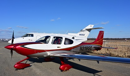 A 2019 Cirrus SR22T Special Edition Arrivée Sonoma looks right at home next to a Beechcraft Hawker XP on the ramp at Teterboro Airport in New Jersey. Photo by David Tulis.