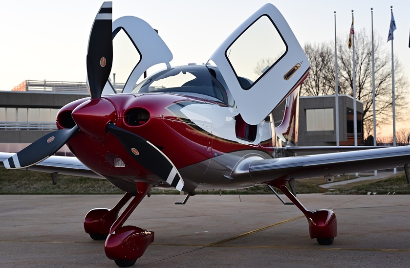 The sun sets behind a 2019 Cirrus SR22T Special Edition Arrivée Sonoma at AOPA headquarters in Frederick, Maryland. Photo by David Tulis.                                                                                                                                                                                                                              