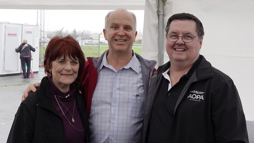 Carla Futtrup reconnects with Dr. James Tearse (center) over 30 years after serving together in Orbis International during an AOPA exclusive tour of the Orbis Flying Eye Hospital. AOPA Media Representative Tom Linton's wife, Connie, also served alongside them. Photo courtesy of Matt Linton.