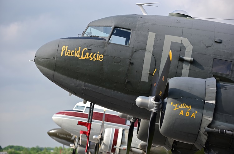 Placid Lassie, a D-Day Squadron Douglas C-47, joins other warbirds on the flight line during the AOPA Frederick Fly-In and eightieth anniversary celebration. The aircraft participated in a formation flight that overflew Washington, D.C., on May 10. Photo by David Tulis.