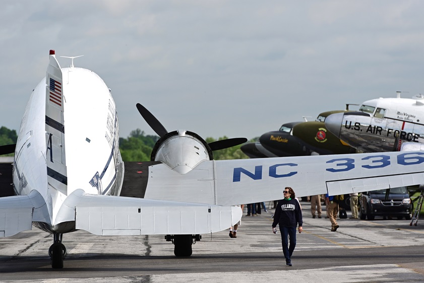 <em>Tabitha May</em>, a Douglas DC–3 badged as a Pan American Clipper, joins five other DC–3 and C–47 aircraft on the ramp. The aircraft participated in a flyover of Washington, D.C., and they are also scheduled to join the Daks over Normandy D-Day reenactment. Photo by David Tulis.