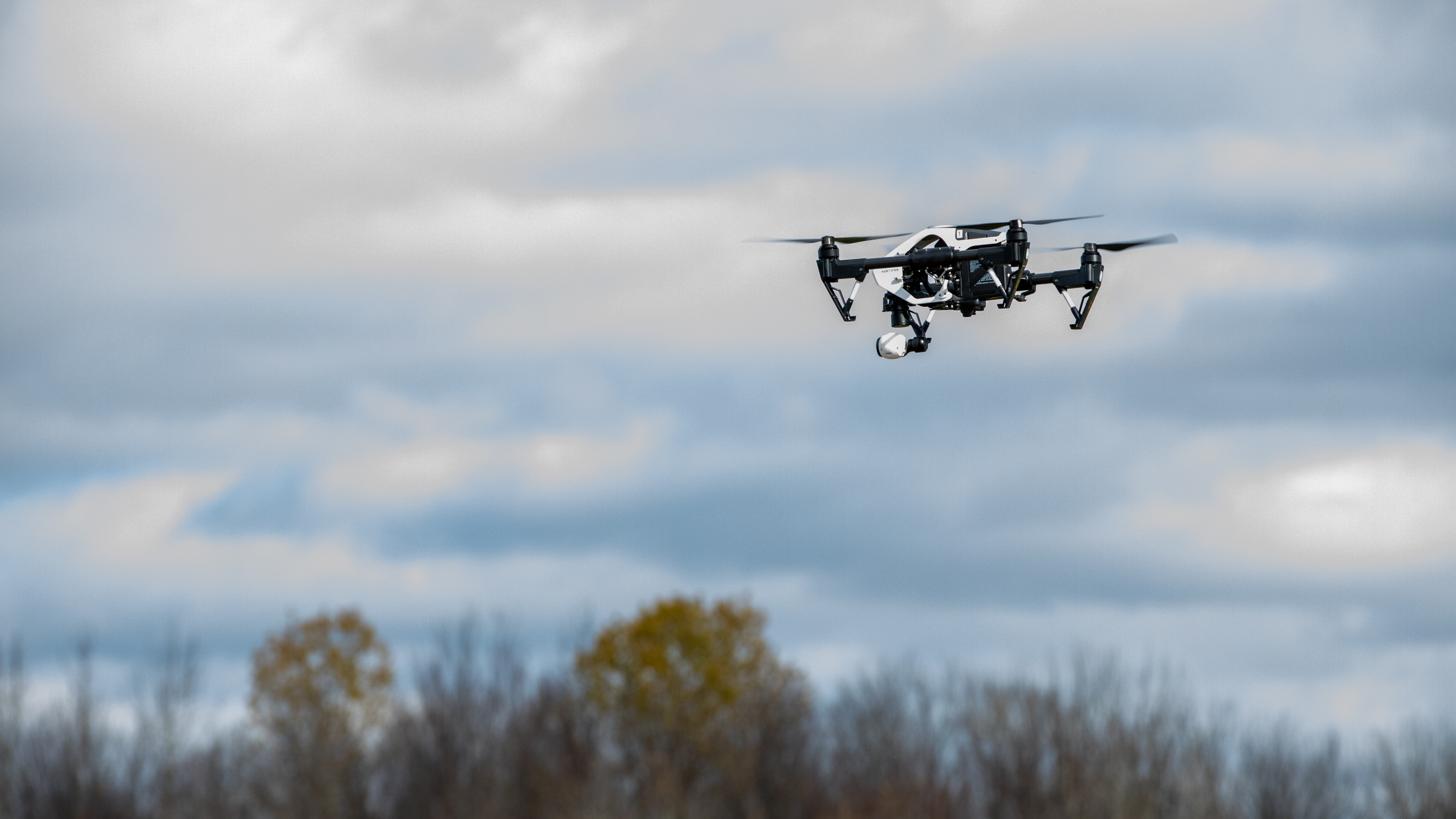 A DJI Inspire 1 drone flown by a firefighter heads to a simulated disaster area. Jim Moore photo.