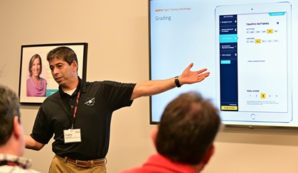 Pablo Maurelia, AOPA senior director of flight training technology, unveils a new AOPA flight training app in development that is designed to track the progress of student pilots and assist flight instructors and flight school business owners with consistency and accountability. Photo by David Tulis.