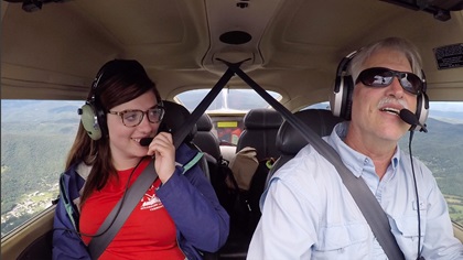 Sixteen-year-old Lauren Tulis chides her father to be wary of mountain waves on their return flight to Maryland after she learned about ridge lift and thermals during a weeklong glider camp at Warren-Sugarbush Airport in the Green Mountains of Vermont. Photo by David Tulis.