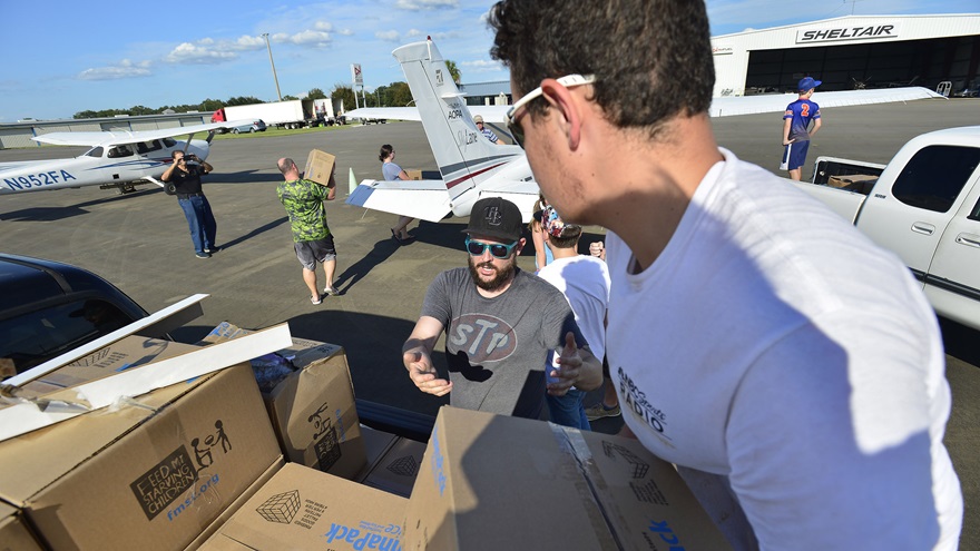 Aerobridge volunteer pilots help transport supplies in times of disaster, such as the pictured relief flight in Florida after Hurricane Irma. Now, Aerobridge is seeking volunteers to provide key transportation during the coronavirus pandemic. Photo by David Tulis.