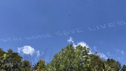 "Stay home, save lives" reinforced important social distancing being practiced all over the United States during the coronavirus pandemic. Photo courtesy of Skytypers Inc.