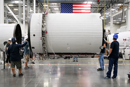 Virgin Orbit employees work in the Long Beach, California, facility. The space company is helping develop breathing ventilator technology that will act as bridge devices to serve as stopgaps when medical-grade ventilators are not in full supply. Photo courtesy of Virgin Orbit.