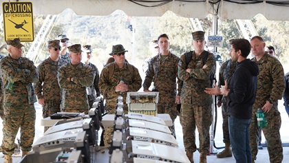 Zipline CEO Keller Rinaudo talks to U.S. Marines, who evaluated Zipline's technology in 2019 for possible use on the battlefield. Photo courtesy of Zipline.