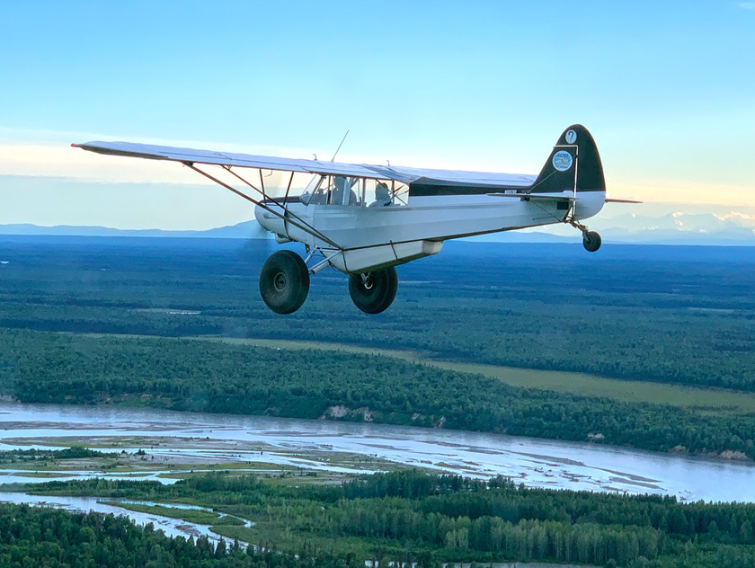 Georgetown University medical student Sarah Powell flies a Piper Super Cub near Anchorage, Alaska. Photo courtesy of ACME Cub Training. 