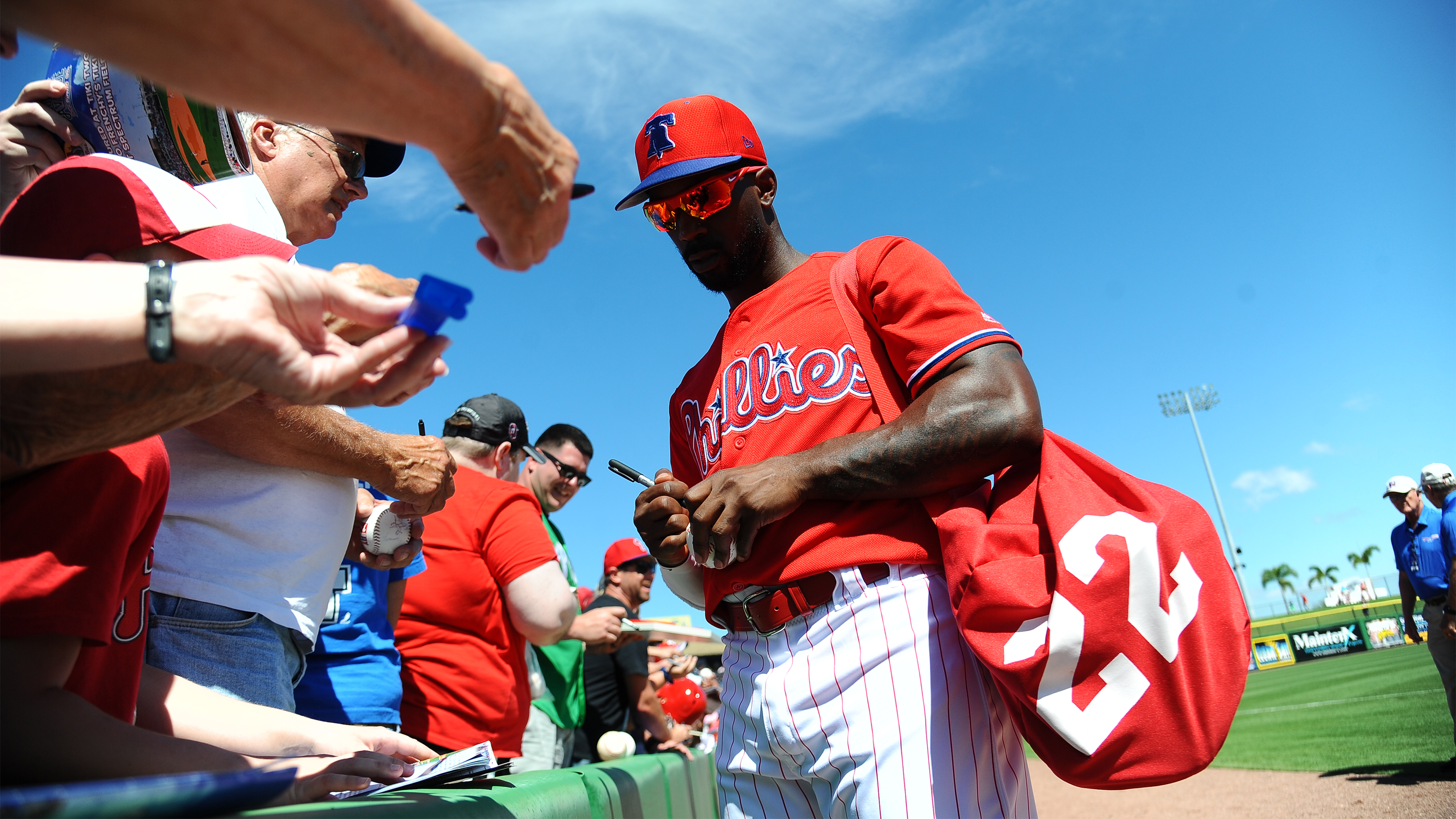 Visit the website for each team to find out where to line up during a game or open practice to score a player autograph. Copyright © The Phillies/Photo by Miles Kennedy. 
