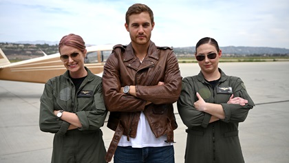 U.S. Marine Corps Capt. Katie Higgins Cook (right) and Marine Corps pilot Alisa Johnson joined Weber on his first group date where contestants were given an intensive aviation primer. Photo courtesy of ABC/John Fleenor.