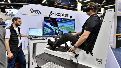VRM Switzerland showed its virtual reality motion flight simulator at HAI Heli-Expo 2020. It combines a motion base with virtual reality goggles. Photo by Mike Collins.