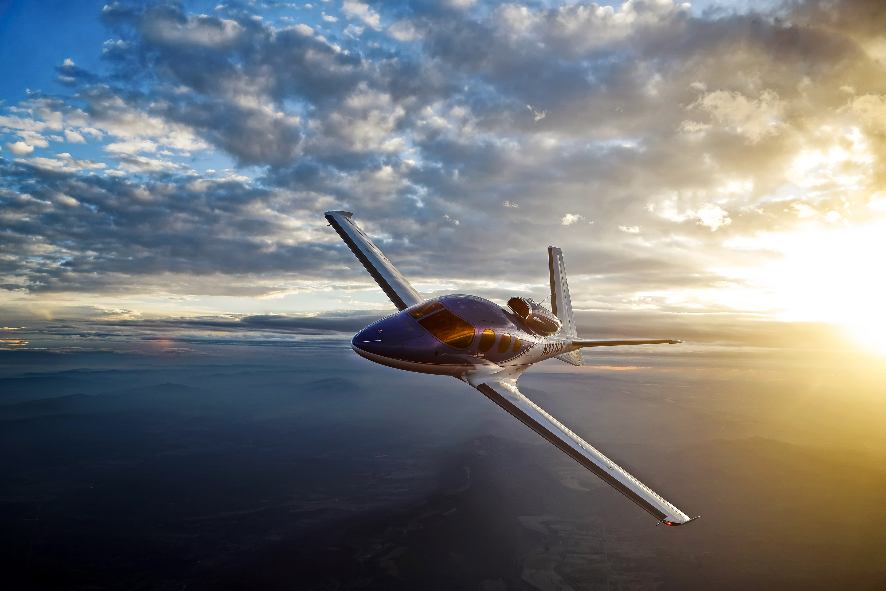 We almost canceled this air-to-air photo shoot of the Cirrus SF50 Vision Jet due to gloomy, overcast skies. However, when the cloud layer finally broke over eastern West Virginia, it gave way to an amazing mix of low light and a dramatic skyscape. Photo by Chris Rose.