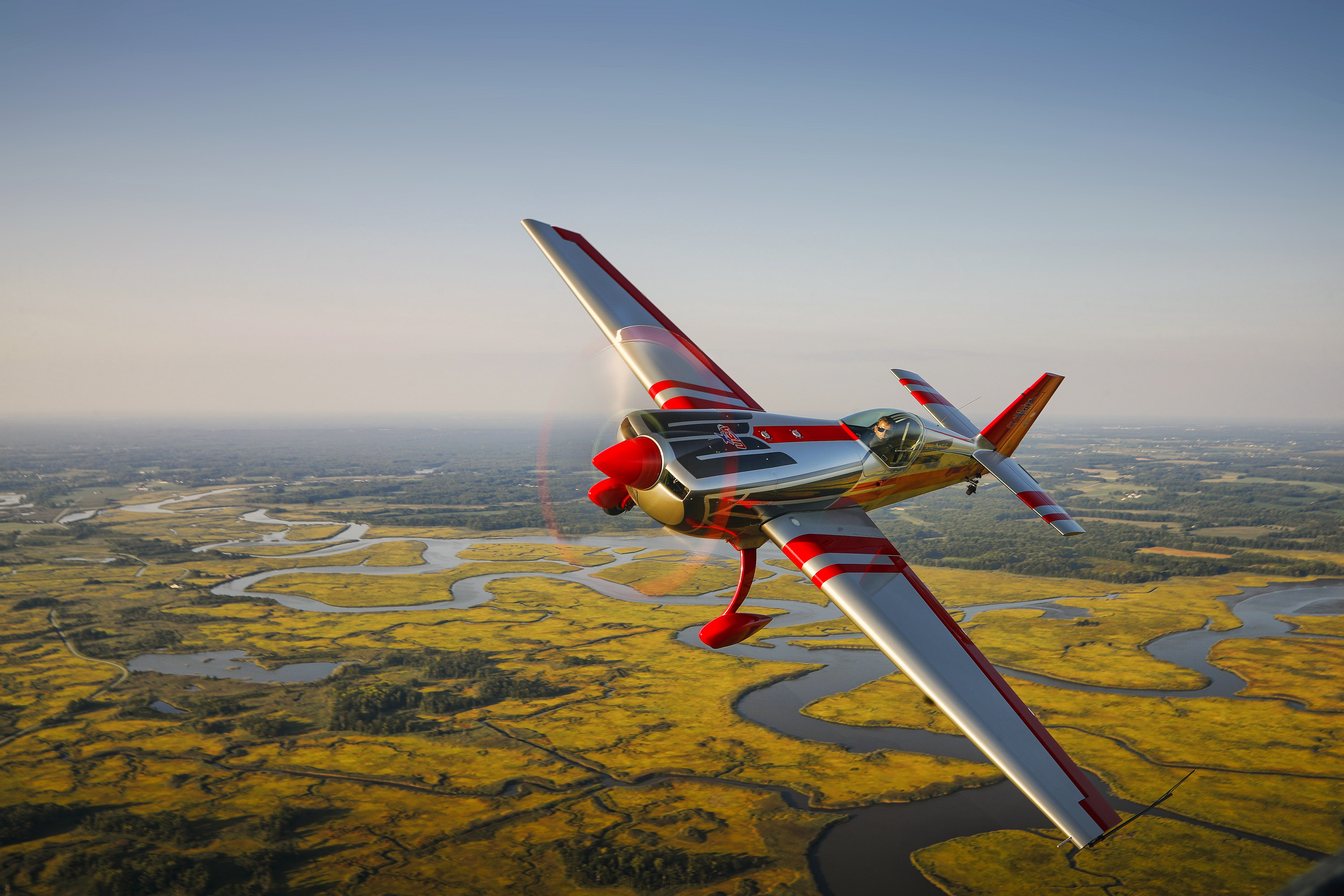 Everything about the Extra 330SC is sexy—looks, performance, and speed. It is just an amazing aircraft to watch and listen to 25 feet away from the end of your lens. Photo by Chris Rose.
