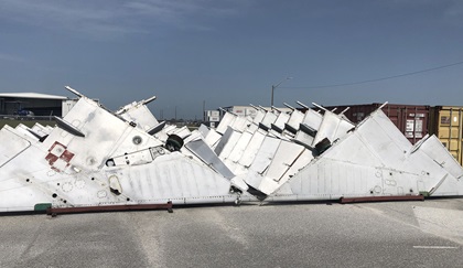 The wings from MiG-21 military jets are stacked in a storage area. Photo courtesy of Dennis Haber.