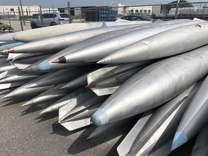 Armament from MiG-21 military jets are removed from the aircraft. Photo courtesy of Dennis Haber.