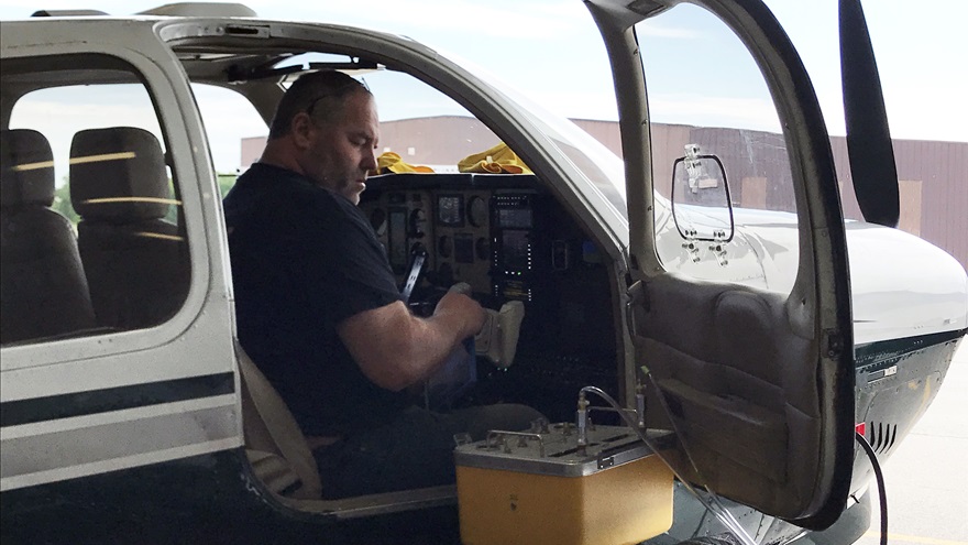 Jeff Wall at Infinity Aviation performs the transponder and altimeter checks on SocialFlight's A36 Bonanza. Photo courtesy of Jeff Simon.