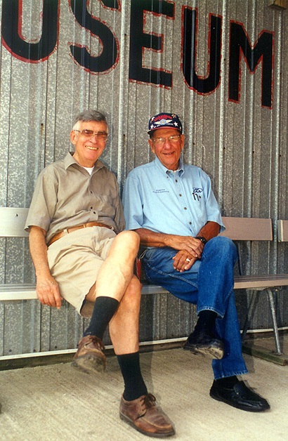 Antique Airplane Association founder Robert L. "Bob" Taylor shares a moment with Experimental Aircraft Association founder and friend Paul Poberezny. Photo courtesy of the Antique Airplane Association.
