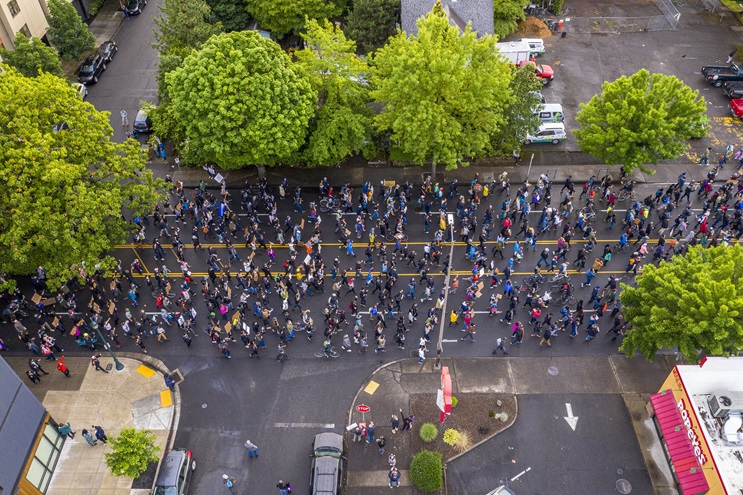 Pivoting as the protesters passed, Jamie Goodwick was able to capture a perspective on the June 6 march down Martin Luther King Jr. Boulevard in Portland, Oregon, without flying his DJI Mavic 2 Pro over people. Photo courtesy of Jamie Goodwick/Portlandrone.
