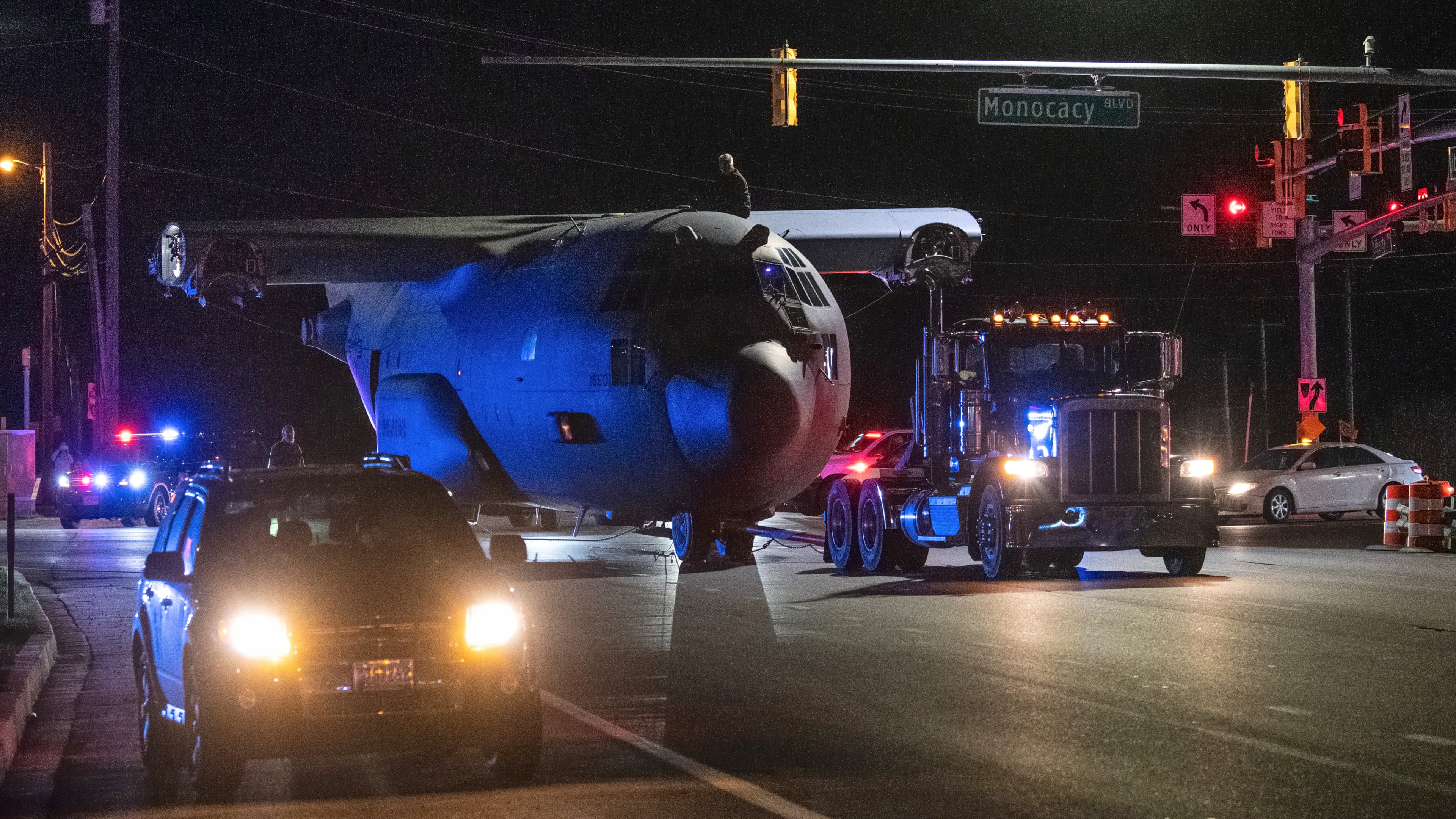 Making its way from Frederick Municipal Airport to Ft. Detrick, an Air Force C-130 turns onto Maryland Route 26 from Monocacy Boulevard, on the north side of Frederick. Photo by Mike Collins.