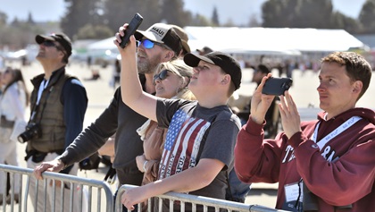 More than 1,000 people came to Moffett Federal Airfield in Mountain View, California, February 29 for the GoFly Prize Final Fly Off. Here, some of them watch the event's airshow. Photo by Mike Collins.