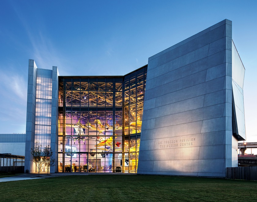 Aircraft are displayed in a four-story gallery. Photo courtesy of The National WWII Museum.