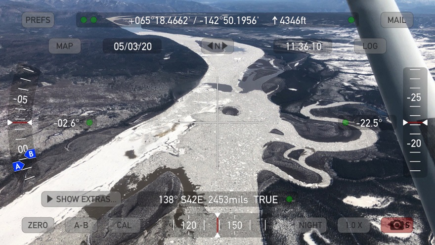 River ice on the Yukon River, looking upstream, at the mouth of the Charlie River. Ice floes are accumulating as they encounter solid ice that hasn't started to move yet. Photos like this, taken with the smartphone using the Theodolite app (or other programs that capture GPS location), are emailed to the National Weather Service to help hydrologists monitor possible flooding risks. Photo by Tom George.