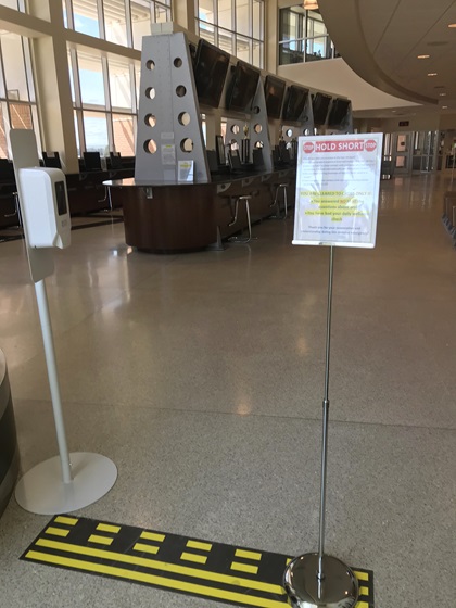 Hold short lines and signage similar to those seen by pilots at airports help alert Embry-Riddle Aeronautical University students to distance themselves from each other. Photo courtesy of ERAU.