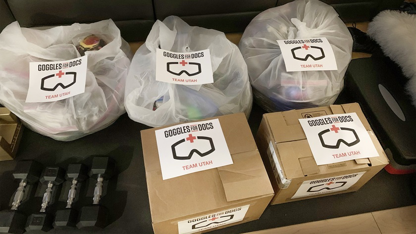 Donated ski or snowboard goggles are weighed before being loaded in a Cirrus SR22T to be flown from Utah to California. 