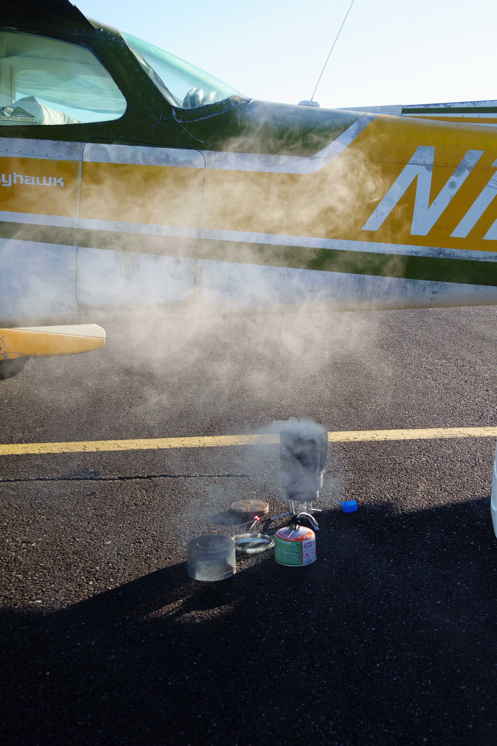 A portable stove lets Filip Wolak and Sarah Tamar cook their own food so that they are as self-sufficient as possible as they fly and camp across the United States. Photo by Filip Wolak.