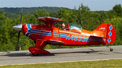 Marc Nathanson, pictured here at the Green Mountain Aerobatic Contest in July 2015, has flown his Pitts S-1T to aerobatic contests for years. This particular Pitts model is highly regarded for its power-to-weight ratio, but not so much for its luggage accommodations. Photo by Jim Moore. 