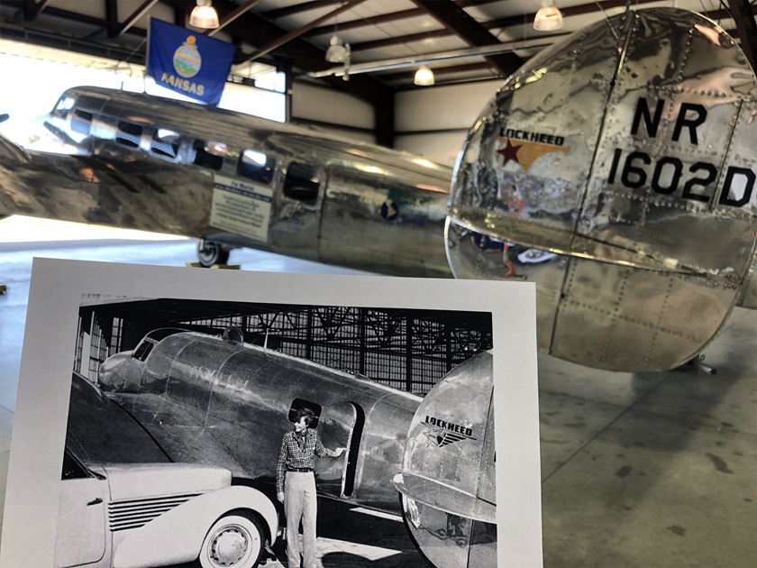 A photo of Amelia Earhart in front of her Lockheed Electra L-10E that she was flying when she disappeared during her circumnavigation attempt is held in front of the sister model L-10E that will be the centerpiece of a new Amelia Earhart Hangar Museum being built in her hometown of Atchison, Kansas. Photo by MeLinda Schnyder. 