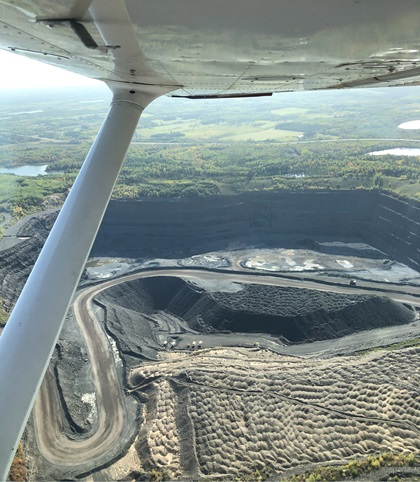 The flight crew provides key observations from about 800 feet above a mine blast zone. Photo courtesy of ArcelorMittal USA.