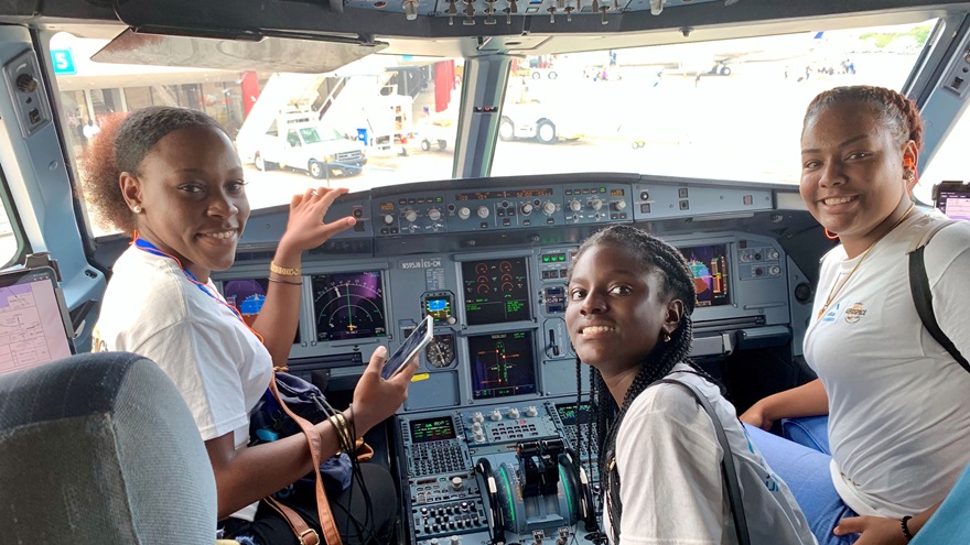 Young girls sit in the cockpit of a JetBlue Airbus A320 during an OBAP ACE Academy. Photo courtesy of OBAP.