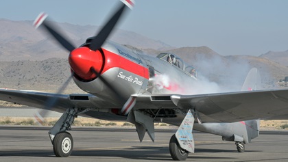 Sanders Aeronautics' Reno Unlimited Gold Class winner and perennial crowd favorite <em>Dreadnought</em> starts on the Reno/Stead Airport ramp. It was among a handful of race aircraft that visited on what would have been the 2020 race weekend. Photo by Joanne Murray.
