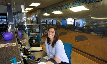 West Houston Airport Customer Service Representative Taylor Bradbury welcomes pilots to the airport. Aircraft owners based at the airport can sign up for instrument training at $10 per hour. Photo courtesy of Woody Lesikar, West Houston Airport. 