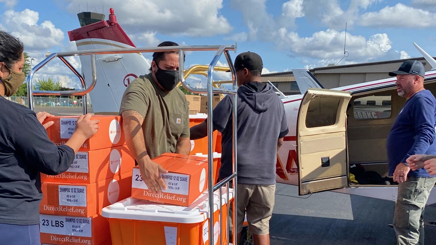 An airlift organized by the California Disaster Airlift Response Team and the Oregon Pilots Association delivered 100,000 KN95 face masks and other essentials to firefighters battling historic wildfires. Photo courtesy of the Oregon Pilots Association.