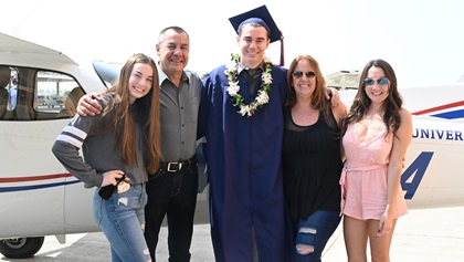 Graduate Adam Eberle and family. Photo courtesy of Mia Rios.