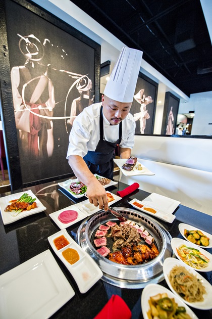 Korean barbecue—grilling meat such as beef, chicken, or pork on gas or charcoal grills inlaid into the dining table—is a popular way to introduce diners to Korean cuisine. High quality cuts of meat are accompanied by a table full of family-style side dishes. There are many Korean barbecue options in Gwinnett County, including Breakers Korean Grill and Barbecue shown here. Photo courtesy of Explore Gwinnett.