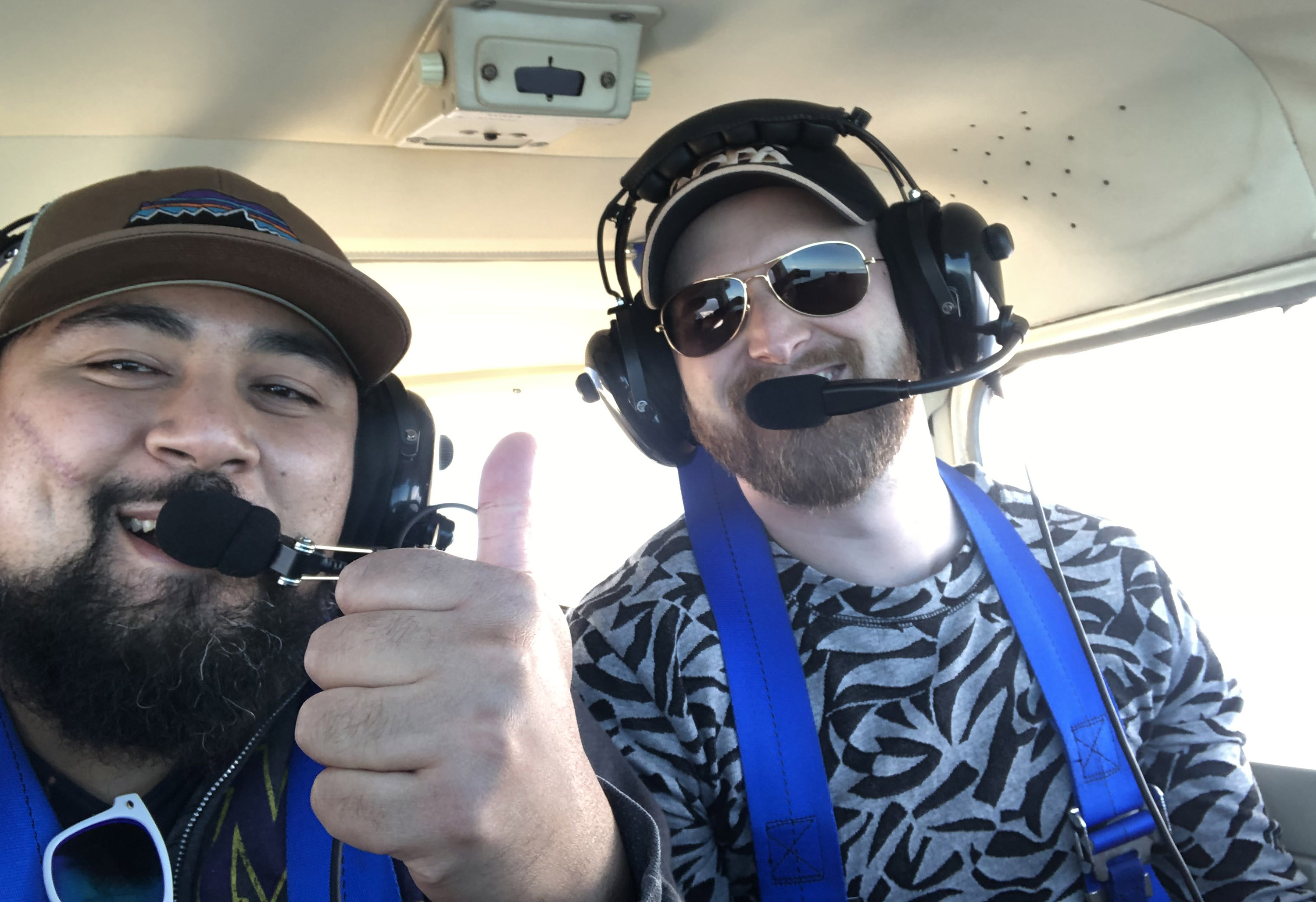 Aviation Youth Empowerment Foundation founder and Cessna 150 owner Nathan Rix flies with Justin Ibrahim, the husband of foundation president Jennifer 'Jen' Lopez Ibrahim. Photo courtesy of the Aviation Youth Empowerment Foundation.