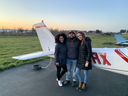 Aviation Youth Empowerment Foundation President Jennifer Lopez Ibrahim, her husband Justin, and Kristen Rix, the wife of founder Nathan Rix, gather for photo before a flight. Photo courtesy of the Aviation Youth Empowerment Foundation.